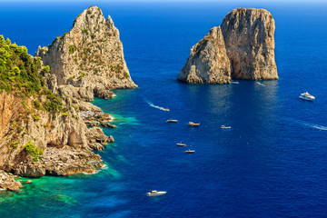 Capri island,beach and Faraglioni cliffs,Italy,Europe