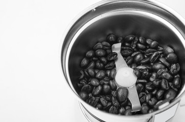 Coffee beans in coffe grinder