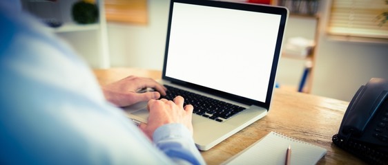 Businessman working on his laptop