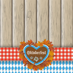 Obraz premium Oktoberfest mit Holzbalken und Lebkuchenherz
