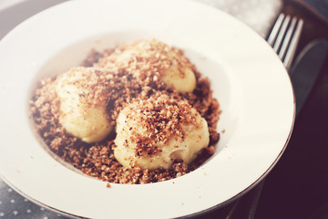 Sweet cottage cheese dumplings with breadcrumbs