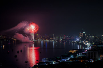Fototapeta premium Night view and fireworks at Pattaya city, Thailand