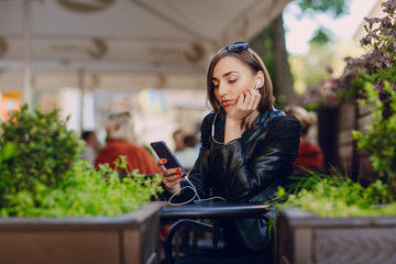 beautiful girl enjoys gadgets