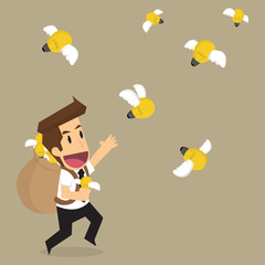 business man holding bulb idea that fly, brainstormt