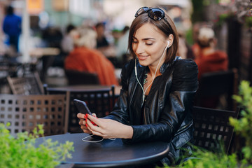 beautiful girl enjoys gadgets