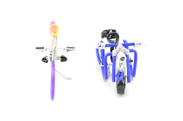 front view of bicycle and scooter made from purple and blue color isolated white background