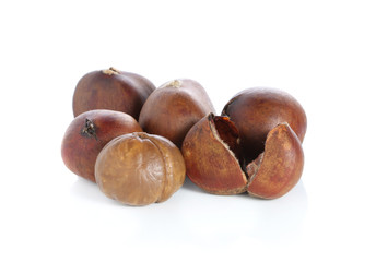 Fresh chestnuts isolated on white
