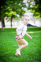 Boy running on grass