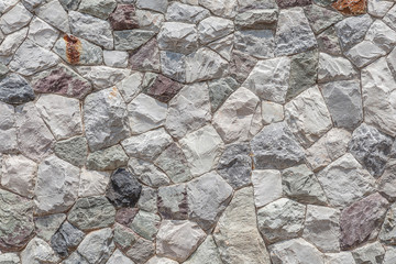 The modern stone wall use as background.