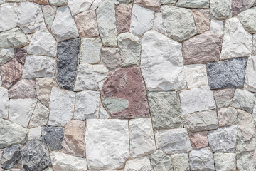 Closeup the modern stone wall with cement surface background.