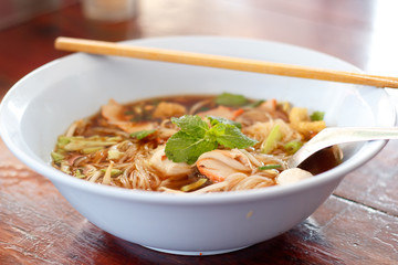 hot bowl of noodles in cafeteria.