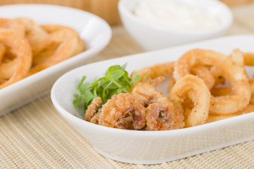 Calamari - Deep-fried squid rings served with garlic mayo.
