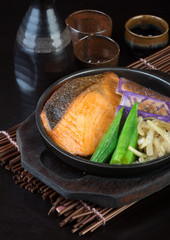 japanese cuisine. hot plate fish on the background
