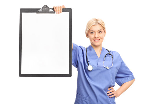 Female doctor holding a clipboard