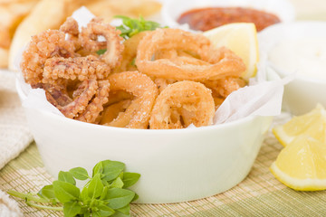 Calamari - Deep-fried squid rings served with garlic mayo and chili sauce.
