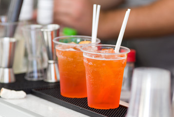 Orange cocktails on bar counter