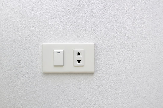 electric plug and switch on wall