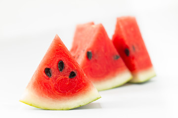 Slice of watermelon on white background.