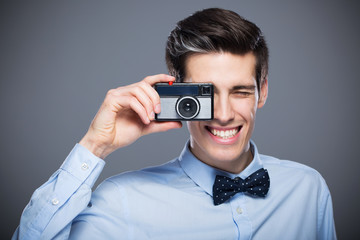 Fototapeta premium Man with vintage camera