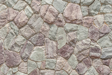 Closeup the modern stone wall with cement surface background.