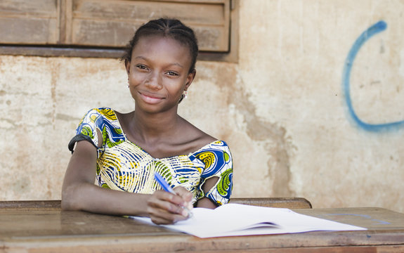 Back To School: African Teenage Girl Smiles in Public School