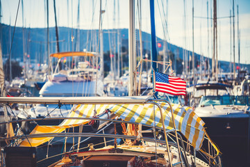 American flag waving from a sailboat 