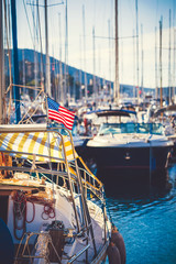 American flag waving from a sailboat 