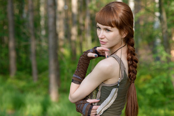 Young beautiful girl in the forest