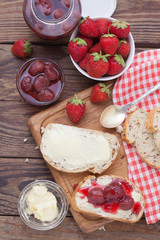 overhead view on healthy breakfast with strawberry jam