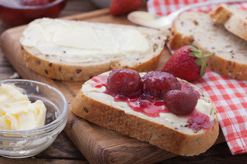 overhead view on healthy breakfast with strawberry jam