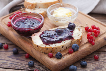 Overhead view on healthy breakfast with strawberry jam