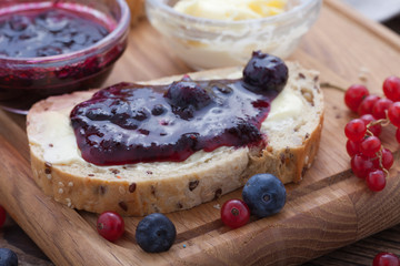 Overhead view on healthy breakfast with strawberry jam