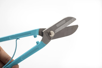 Zinc scissors on white background.