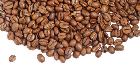 Obraz premium a lot of coffee beans on the background