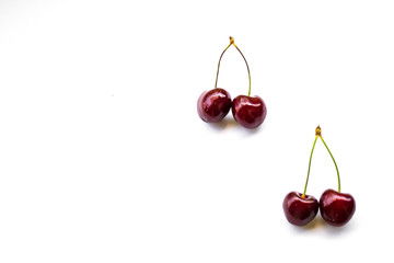two couple sweet cherries