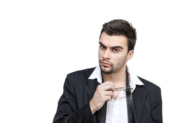 fashion portrait of man, biting sunglasses 