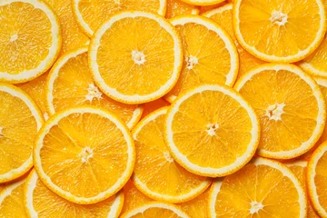 Rolgordijnen Colorful orange fruit slices  © Dmitry Rukhlenko