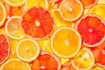 Foto op Plexiglas Vruchten Kleurrijke plakjes citrusvruchten