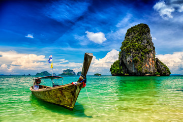 Long tail boat on beach, Thailand