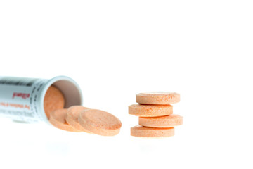 Orange lozenges isolated on white