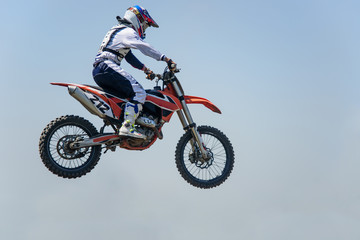Obraz na płótnie Canvas Motocross Rider Jump