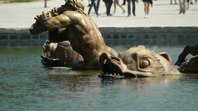 Detail of the fountain of Apollo in Versailles gardens. France