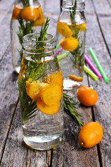 Drink with citrus and rosemary