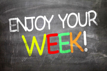 Obraz premium Enjoy Your Week written on a chalkboard