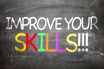 Fototapeta premium Improve Your Skills written on a chalkboard