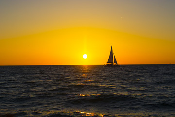 Obraz na płótnie Canvas Boat Silhouette in the Sunset