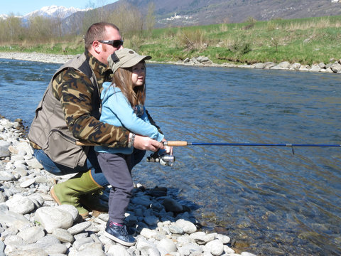 Father and daughter fishing Stock Photos - Page 1 : Masterfile
