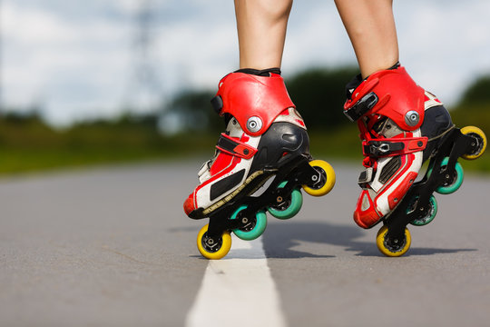 Legs of girl having roller skate exercise