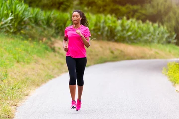 Aluminium Prints Jogging  African american woman runner jogging outdoors - Fitness, peopl