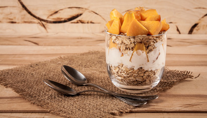 nectarine, peach jam on wood background